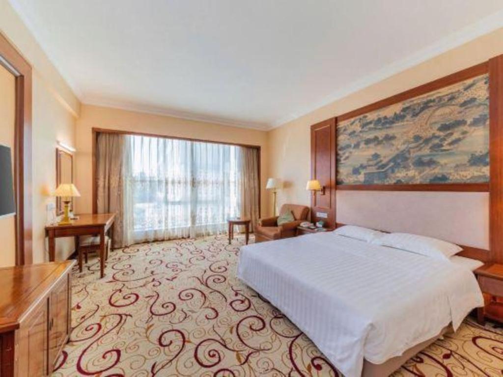 Fenggang Gladden Hotel Tiantangwei Екстериор снимка