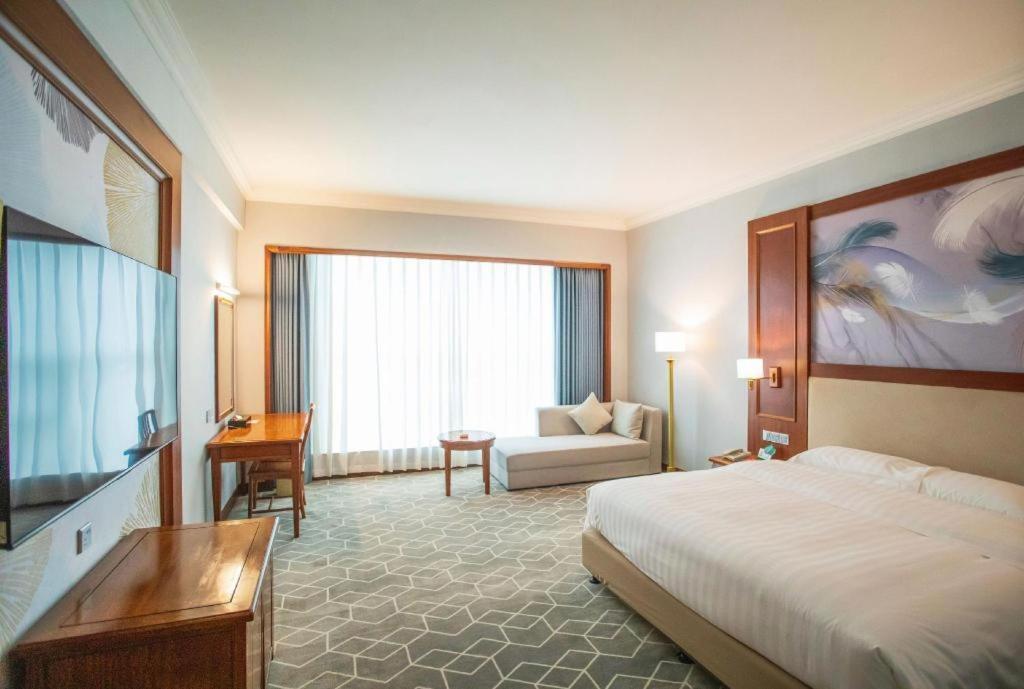 Fenggang Gladden Hotel Tiantangwei Екстериор снимка