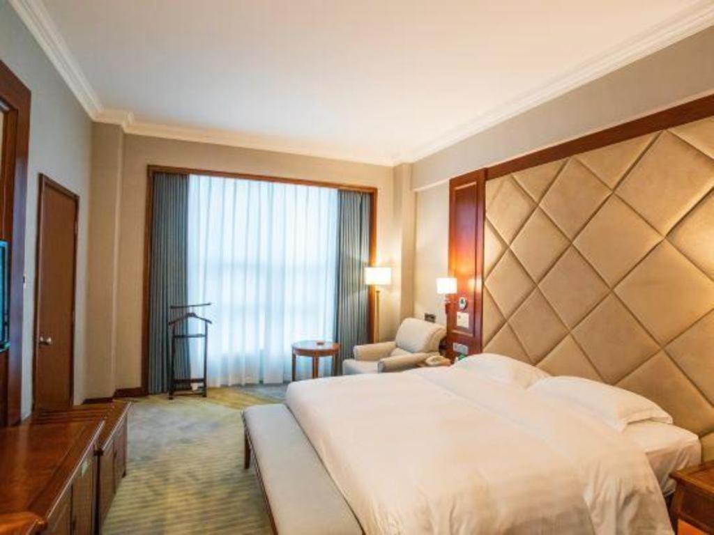 Fenggang Gladden Hotel Tiantangwei Екстериор снимка