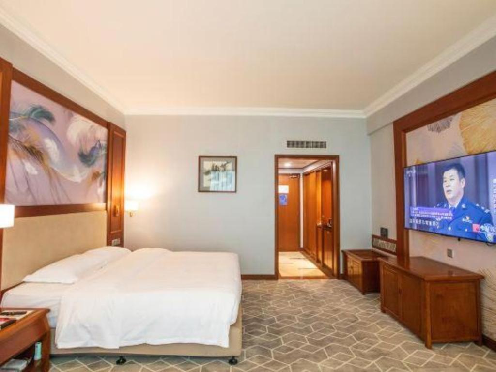 Fenggang Gladden Hotel Tiantangwei Екстериор снимка