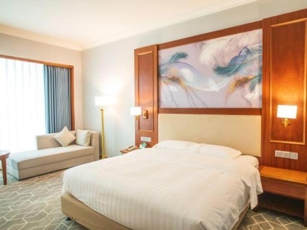 Fenggang Gladden Hotel Tiantangwei Екстериор снимка