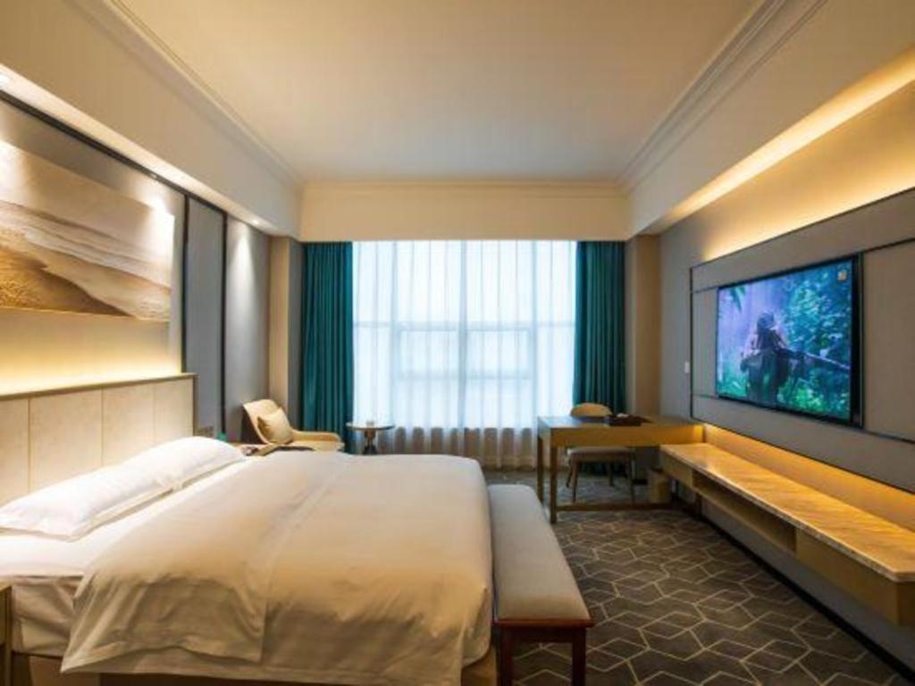 Fenggang Gladden Hotel Tiantangwei Екстериор снимка