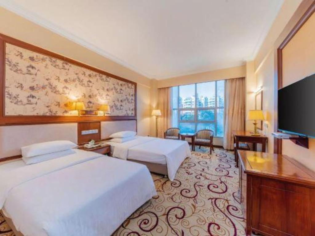 Fenggang Gladden Hotel Tiantangwei Екстериор снимка