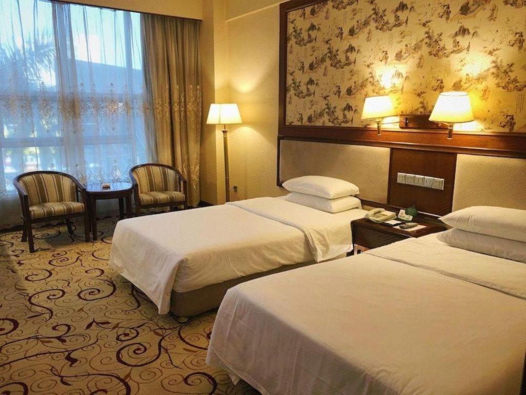 Fenggang Gladden Hotel Tiantangwei Екстериор снимка