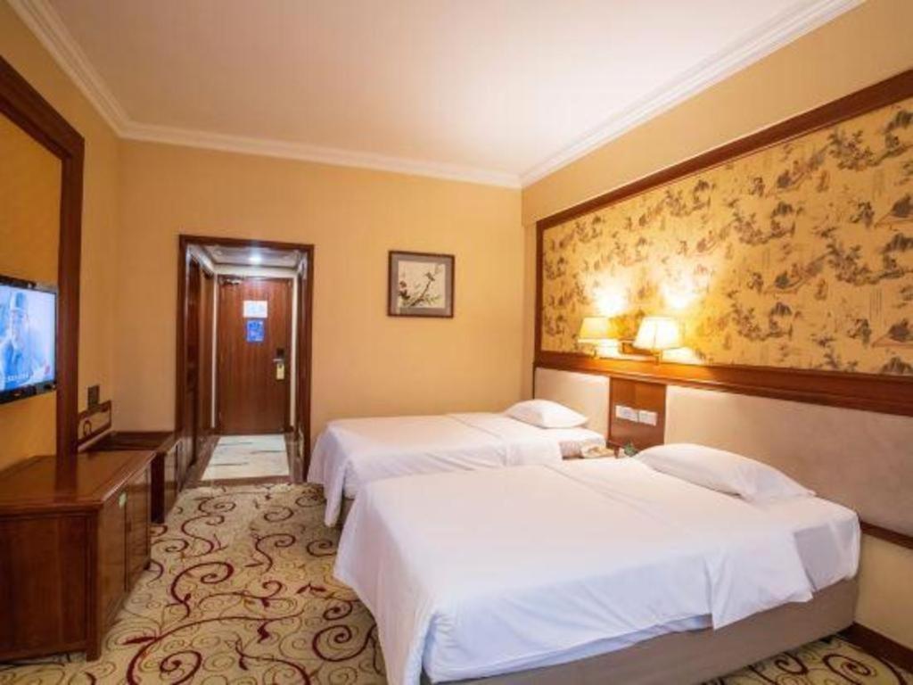 Fenggang Gladden Hotel Tiantangwei Екстериор снимка