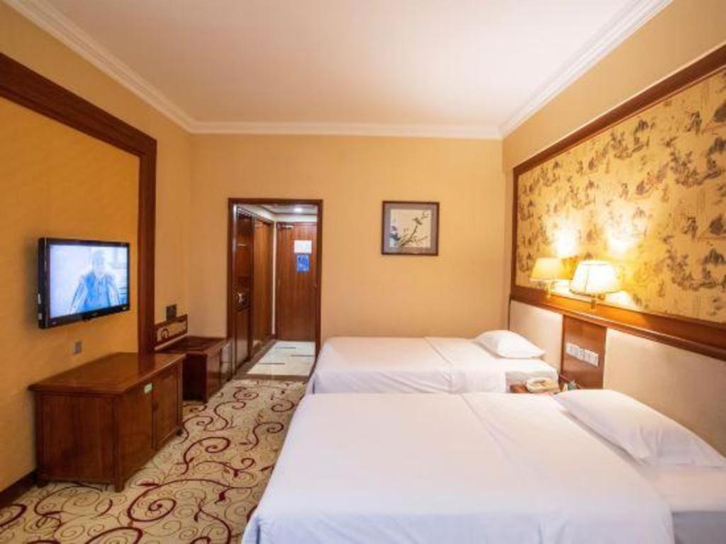 Fenggang Gladden Hotel Tiantangwei Екстериор снимка