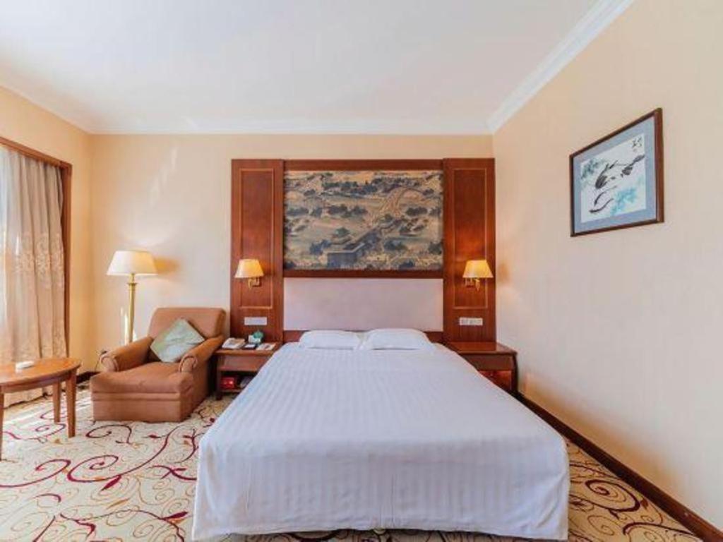 Fenggang Gladden Hotel Tiantangwei Екстериор снимка