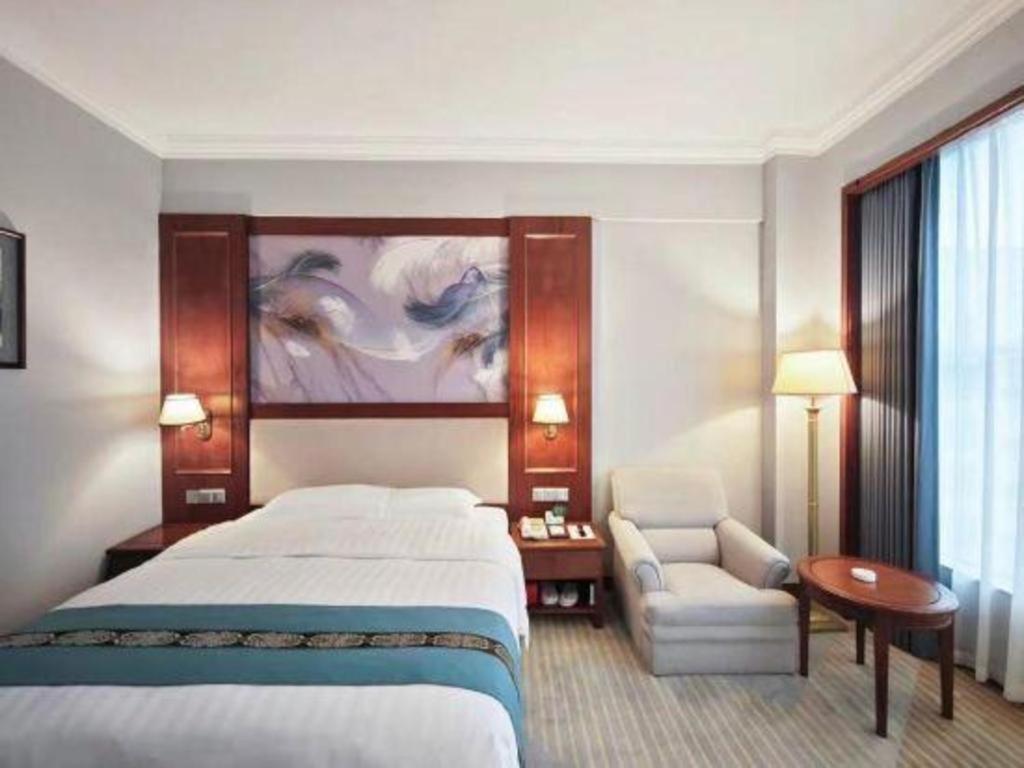 Fenggang Gladden Hotel Tiantangwei Екстериор снимка