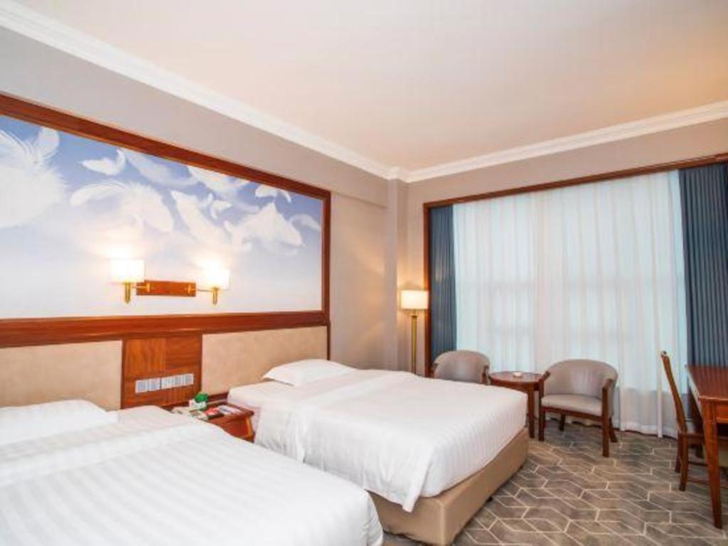 Fenggang Gladden Hotel Tiantangwei Екстериор снимка